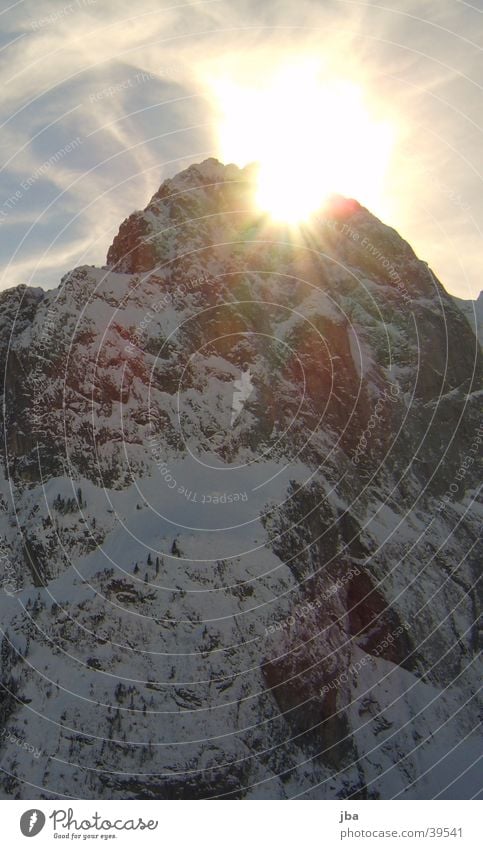 Sonnenberg peak Gstaad Mountain Point Sun behind the mountain zealot