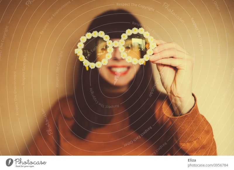 Woman with flower sunglasses. Retro mood, optimism and good mood. Sunglasses Optimism summer atmosphere little flowers Summer colourful Yellow Orange portrait