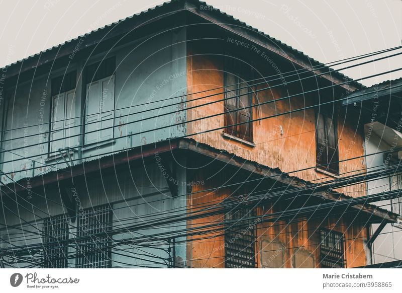 Old rustic historic house in Yaowarat Road or Chinatown in Bangkok City Thailand low angle view old house historic buildings yaowarat road bangkok chinatown