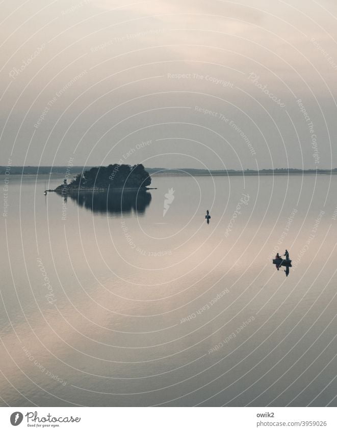 Free floating Reservoir Island Sky Evening Calm Leisure and hobbies Watercraft Far-off places Freedom Surface of water Glittering Long shot Nature Landscape