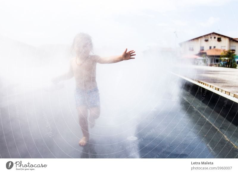 Summer happy kid running across the water Summery Meadow naturally boy funny enjoy Joy cheerful Jump hossegor beachtown summerday happiness happymoment kids