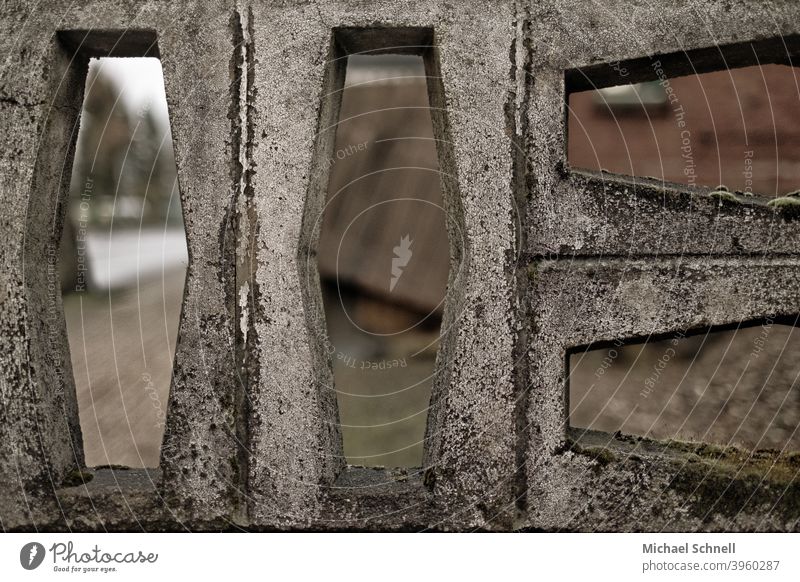 View through a wall Wall (barrier) Building stone Exterior shot Colour photo Deserted Stone Subdued colour Vista see through Forms and structures