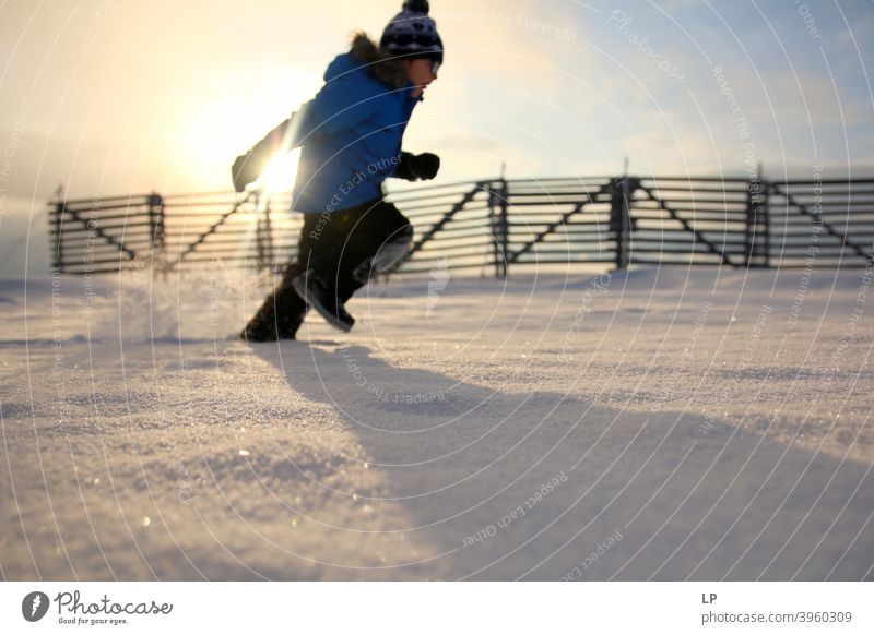 child running in the snow Exterior shot Delightful emotional seasonal Snowflake holiday Action kid Clothing Weather Nature Child Winter Vacation & Travel