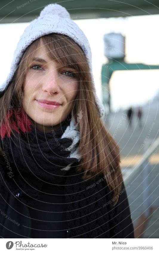 Smile despite cold Accessory portrait Feminine Cap Clothing naturally Hair and hairstyles chill Winter Lifestyle Looking into the camera Long-haired Face Lips