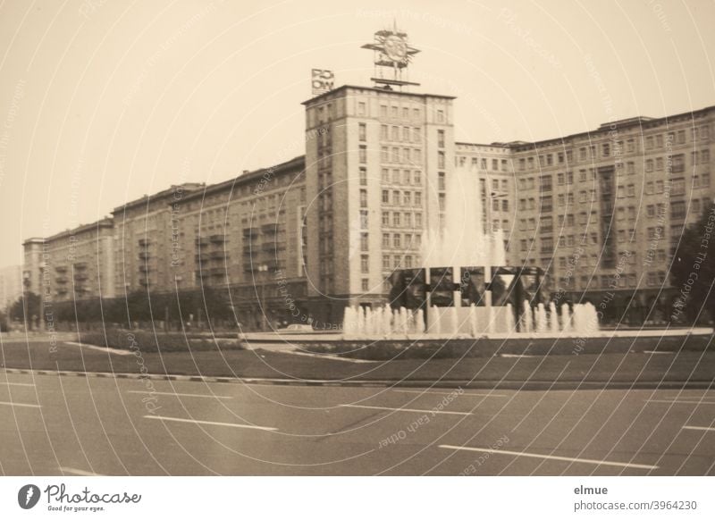 Black and white picture of Strausberger Platz in Berlin from the 1970s / analogue photography Strausberg Square Friedrichshain Floating ring urban square Well