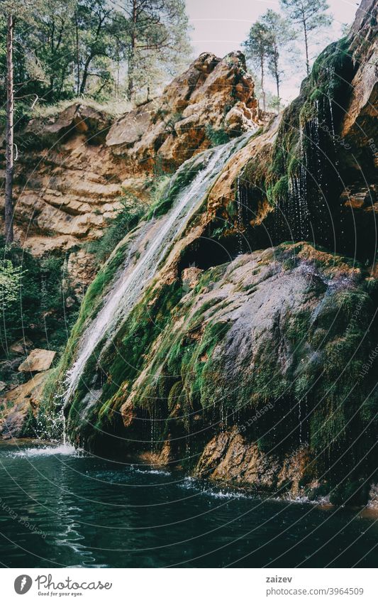 landscape with a pool with waterfall in a place of spain relaxing peaceful colourful tranquility paradise abstract wallpaper reflection jungle rainforest deep