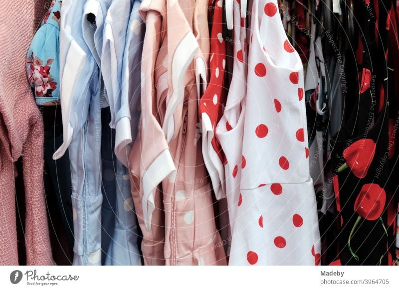 Nostalgic summer dresses with patterns of the fifties and sixties on the flea market at the Golden Oldies in Wettenberg Krofdorf-Gleiberg near Giessen in Hesse