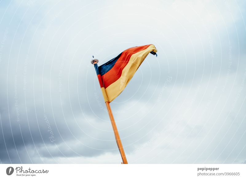 German flag German Flag Germany Patriotism Ensign Red Black Gold Politics and state Exterior shot Colour photo Wind Blow Pride Day Deserted Flagpole