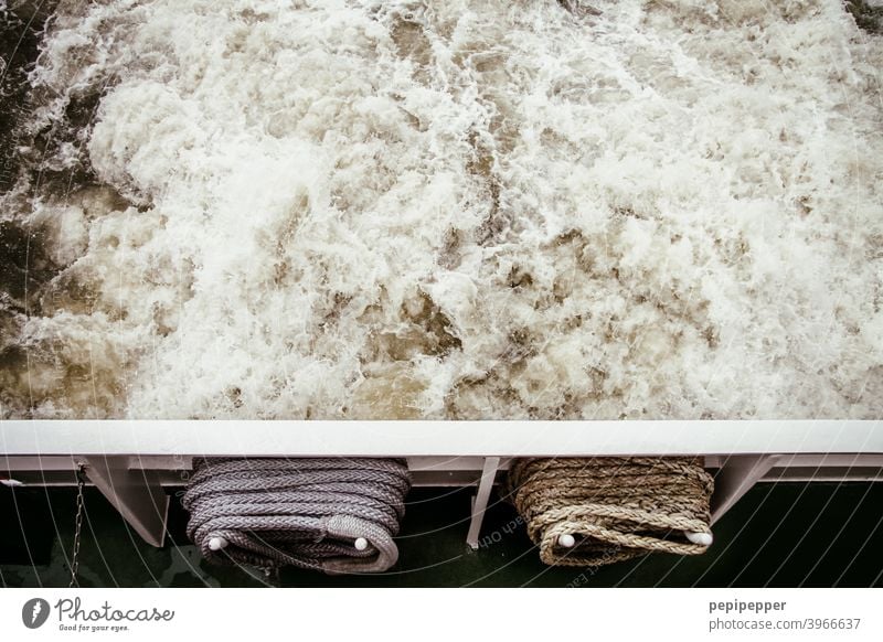 swirling water at the stern of a ferry Stern Navigation shipping shipping line Watercraft Ocean Harbour Vacation & Travel Waves Surface of water Exterior shot