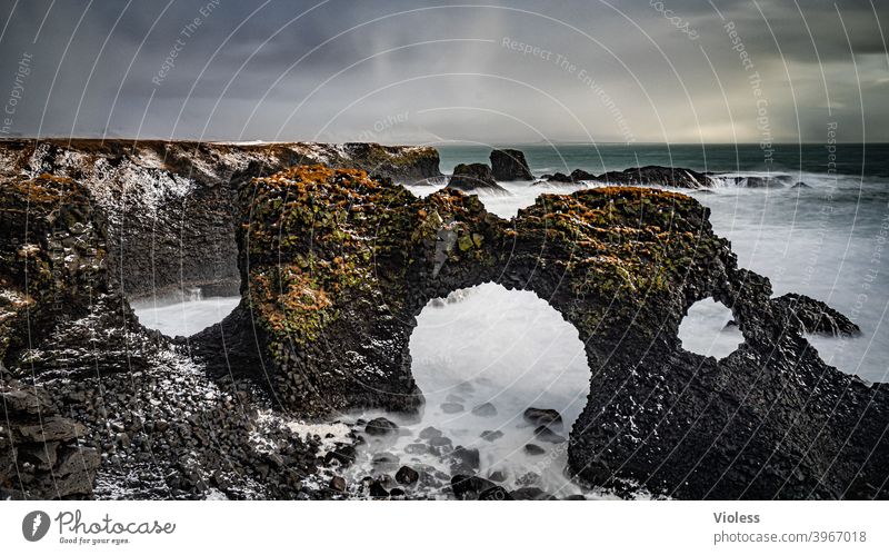 Rock arch Gatklettur near Arnarstapi Exterior shot Colour photo Iceland naturally Hill Gale Wind Weather Clouds Sky Landscape Nature Shadow Light Skógafoss Rain