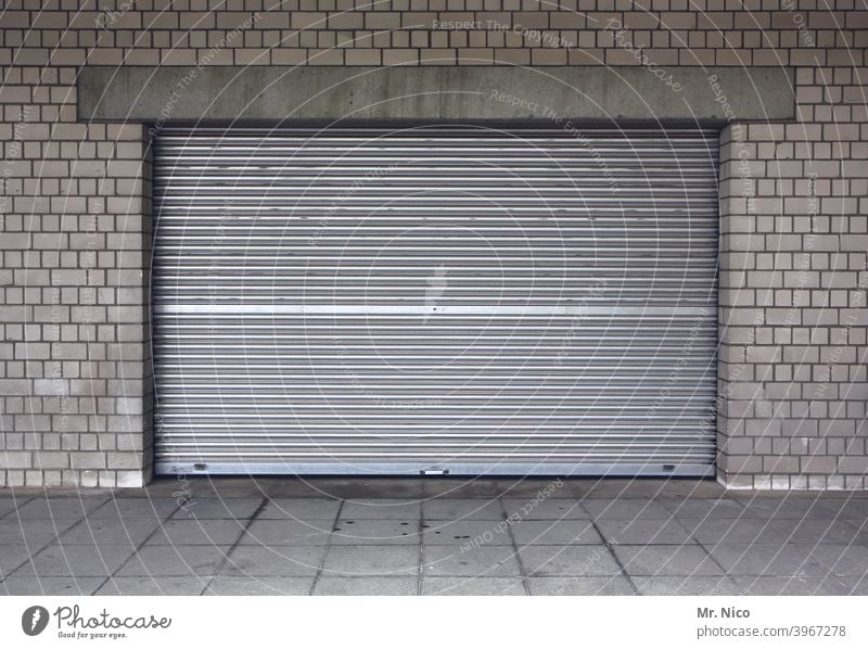 roller shutter Goal Storage Warehouse Depot Building Closed Gloomy Rolling door Stock of merchandise Gray Garage Garage door Please keep driveway clear