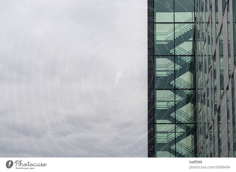 Transparent staircase with cloudy sky - it's cold outside. Staircase (Hallway) Green Stairs Banister somber Dark Diffuse transparency High-rise Architecture