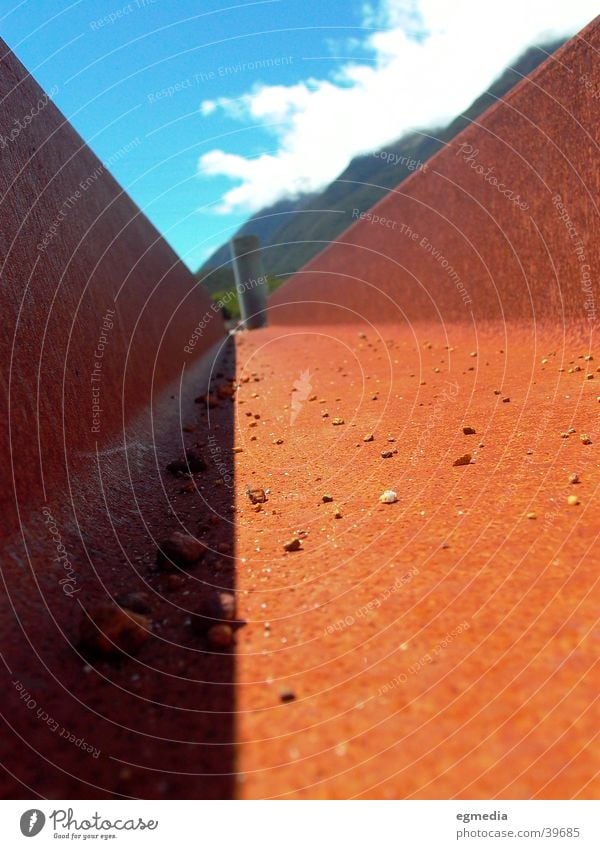 Rust & Shadow Railroad tracks Iron Red Industry Macro (Extreme close-up)