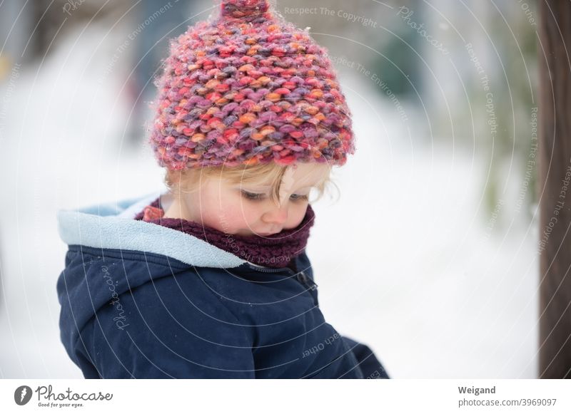 Little child in the snow Child Toddler Cap Snow Parenting Winter Cold Family