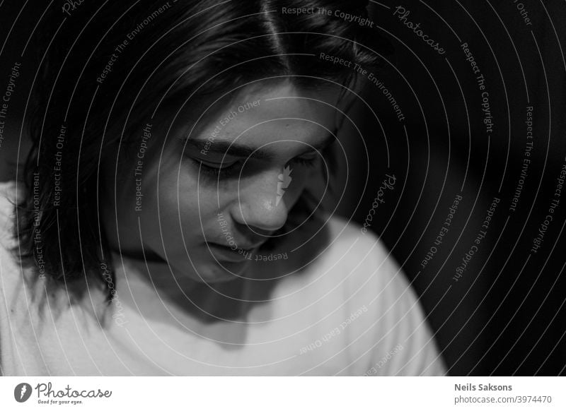 portrait of a young man face shadow sunrays window serious faceportrait contrast male handsome guy style Black and white photography black and white casual