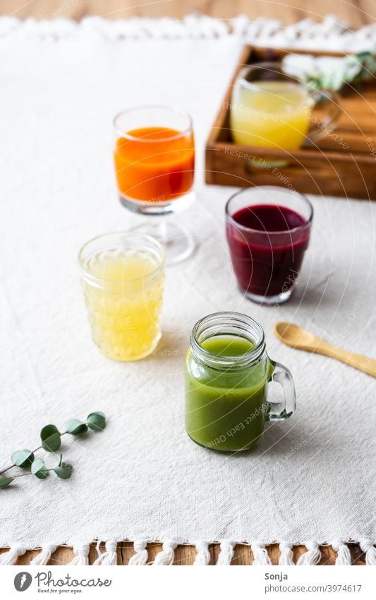 Healthy juices in different glasses on a linen tablecloth Juice Fresh variation Glasses Fruit Beverage Nutrition Colour photo Healthy Eating Diet