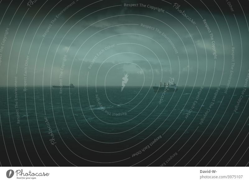 Ships on rough seas ships Storm ocean Ocean somber Waves coast Gray Clouds Thunder and lightning Bad weather Gale peril