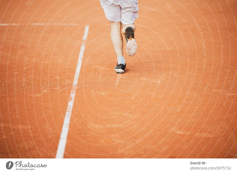 Athlete running on a sports field Sports Walking Running Sportiness Runner Running sports Speed Movement Jogger Healthy workout Fitness Man feet Legs