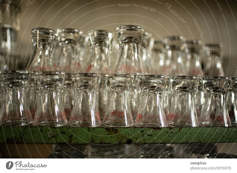 Shot glasses Beer Glasses Counter Kölsch kölschglas Bar Roadhouse Shelves flushed Gastronomy neat Pub Alcoholic drinks bar booze Schnaps glass stacked