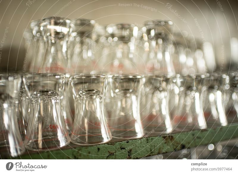 Shot glasses Beer Glasses Counter Kölsch kölschglas Bar Roadhouse Shelves flushed Gastronomy neat Pub Alcoholic drinks bar booze Schnaps glass stacked