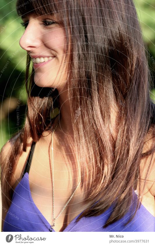 young woman standing in the sunlight Sunlight Long-haired naturally feminine To enjoy enjoying Summery Contentment portrait Sunbathing Young woman vacation