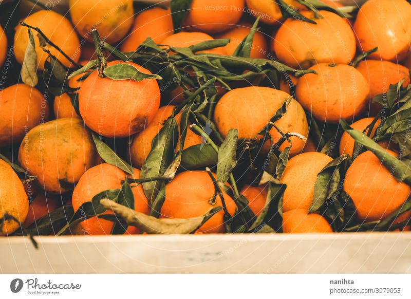 Valencia, Spain, delicious seasonal clementines tangerine fruit sweet food raw harvest healthy vitamin citrus citric many abundance orange green leave organic