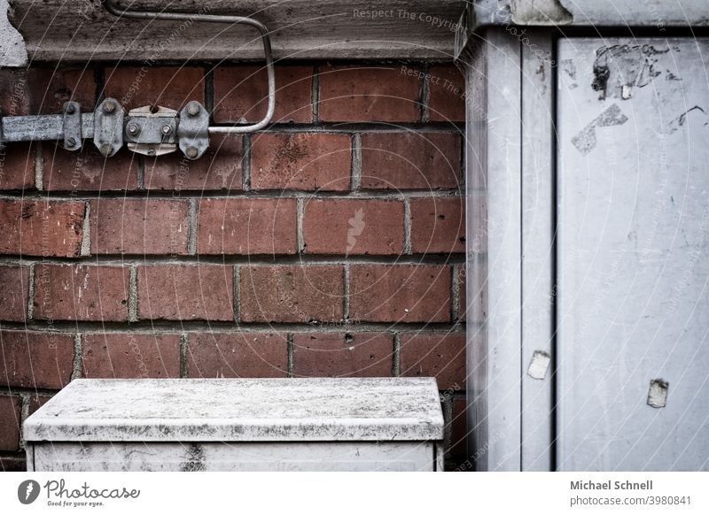 Old brick wall with power cables and boxes power box stream Electricity Exterior shot Energy Technology Gloomy dreariness