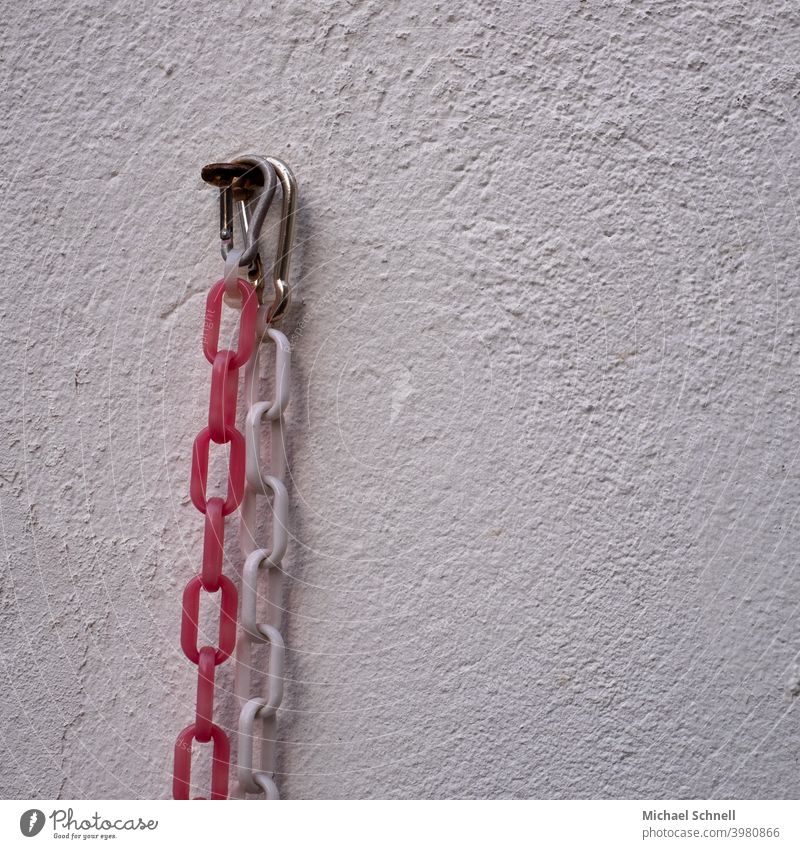 chain barrier Shut-off chain Reddish white White Colour photo Exterior shot cordon Hang