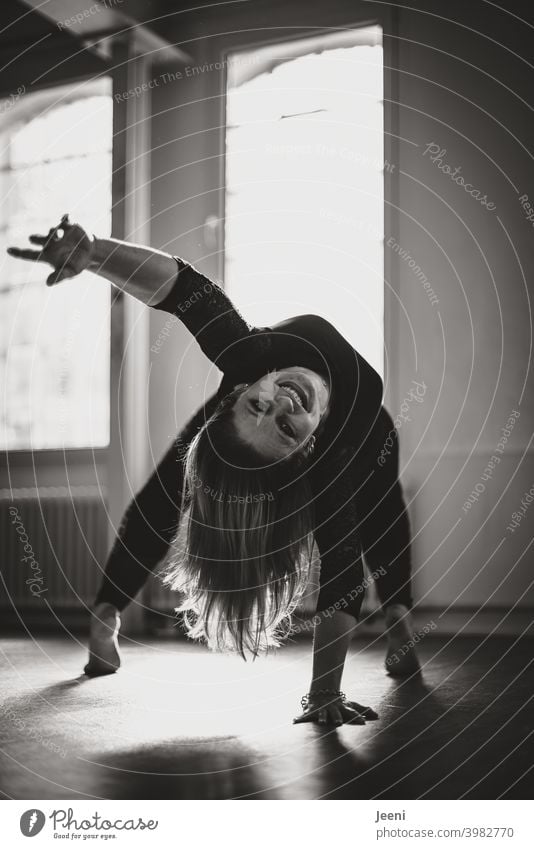 Young beautiful dancer working out in ballet/fitness studio Woman Young woman Feminine Light Dancer Sunlight Shadow Contrast Rich in contrast