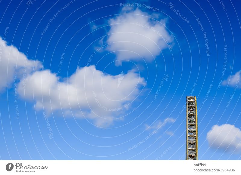 Ferris wheel in front of blue sky with some white clouds Blue Blue sky Clouds Clouds in the sky minimalism Minimalistic Wheel Public Holiday Festival Circle