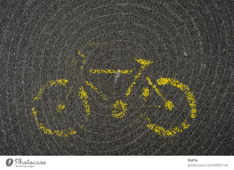 Worn out bike lane sign on a roadway. Wheel Bicycle Street off traffic guidance Road safety interlocking blocks Transport Town urban city views Pictogram symbol