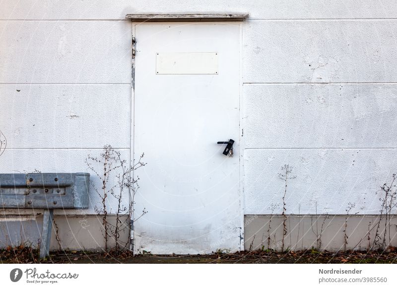 Broken open door at a warehouse Break-in burglars Lock Wall (building) Broken up Storage Load business Store premises demolished Destruction criminal