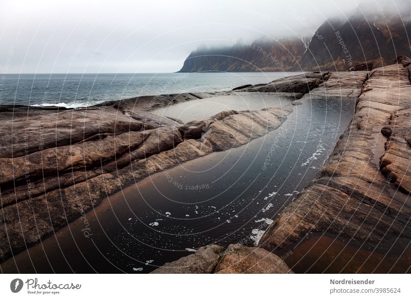 Ersfjord on Senja in Norway during rainy weather ersfjord Ocean coast mysticism Rain Rock Water ocean mountain mountains North Sea Atlantic Ocean Waves Mystic