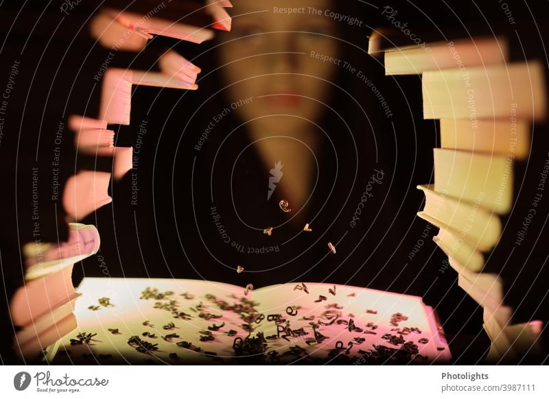 Woman behind stack of books watches flying letters Book Literature Reading do magic sorcery Flying Reading matter Page Library Know Education School Stack