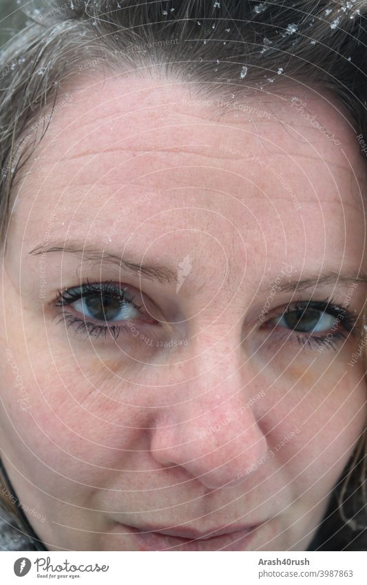 young woman in snow shower (self-portrait) young maiden Face tired Funeral Airplane Looking into the camera look on one's own Direct colored chill Earnest