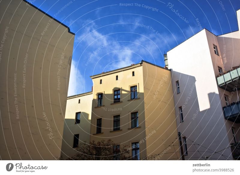 Angled backyard in Schöneberg Old building on the outside Fire wall Facade Window House (Residential Structure) Sky Sky blue rear building Backyard Courtyard