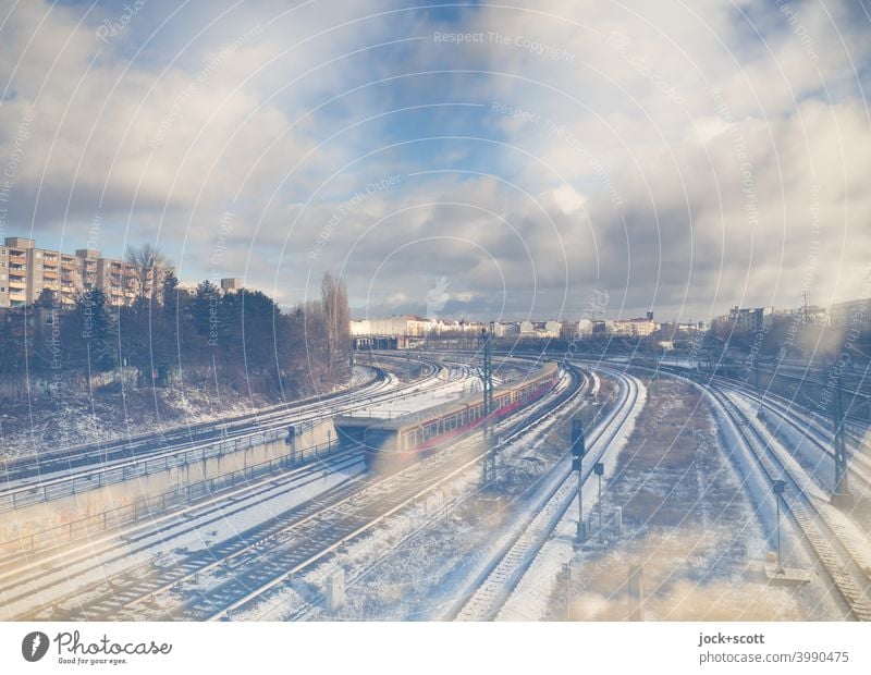 Northern cross with lots of snow and clouds Berlin-Wedding Commuter trains Rail transport Railroad tracks Double exposure Sky Clouds Public transit