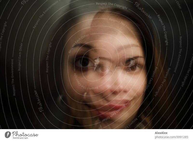 double exposure portrait of a young brunette woman smiling in both pictures Young woman pretty Brunette Long-haired Slim teenager 18-25 years