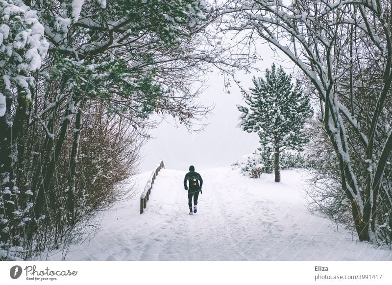 Now hurry... | jog up the snow-covered mountain. Jogging Hill Snow Winter Sports Walking Runner Jogger Running sports Cold snowy snowed over Athletic Fitness