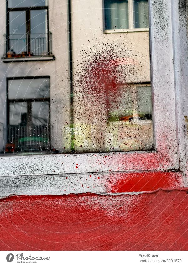 Window frame smeared with paint Facade Building Architecture Town Wall (building) Exterior shot Colour photo Downtown Living or residing