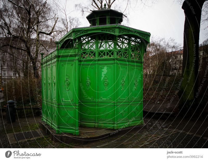 Café Octagon comfort station Prenzlauer Berg Urinal cast-iron Screening senefelderplatz Schönhauser Allee Green Winter's day Bad weather bare trees Architecture