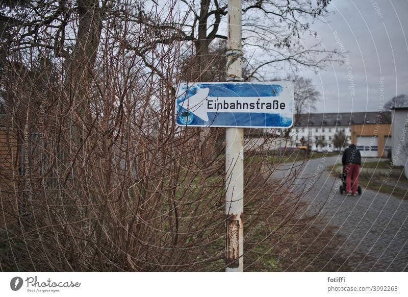 Um... which way? One-way street Street Signs and labeling Traffic infrastructure Exterior shot Colour photo Road sign Town Futile Exit route Safety Bans