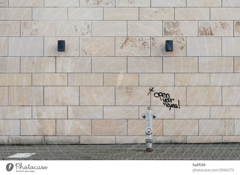 Augen auf / open your eyes - saying on the wall look up Fire hydrant Typography Street art Characters words Graffiti dunning watch attentiveness