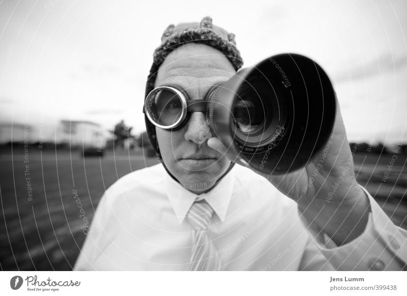 Man with aviator glasses uses lens as binoculars. He is wearing a shirt and tie. Office work Masculine Adults 1 Human being Media New Media Workwear Shirt Tie