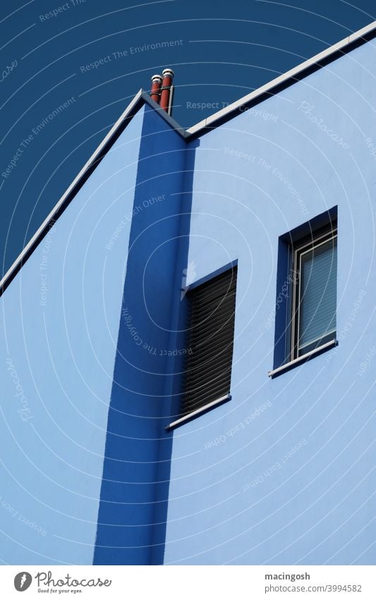 Blue house facade in front of blue sky Facade House (Residential Structure) Shadow Contrast Midday Exterior shot Deserted Window bluish geometric minimal