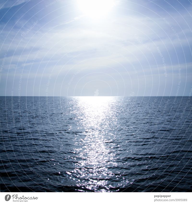 Horizon with sun reflection on open sea Sun's reflection ocean Ocean Water Sunlight Sky Vacation & Travel Summer Lake Far-off places Exterior shot