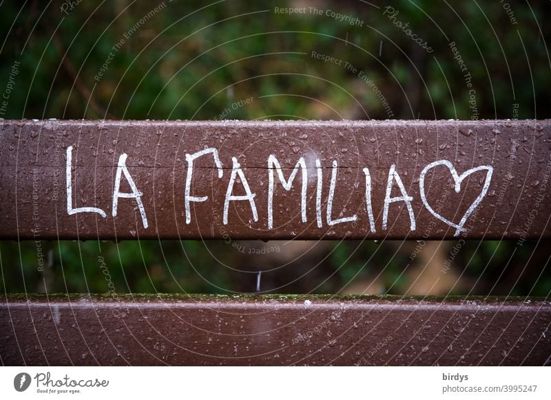 La Familia. The family, inscription in Spanish with heart Family & Relations Attachment retention Safety Domestic happiness Safety (feeling of) Love family life