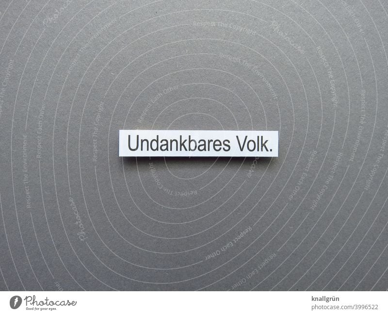 Ungrateful people. dissatisfied Frustration Emotions Anger Grouchy Aggravation Aggression Animosity Argument Signs and labeling Studio shot Colour photo Gray