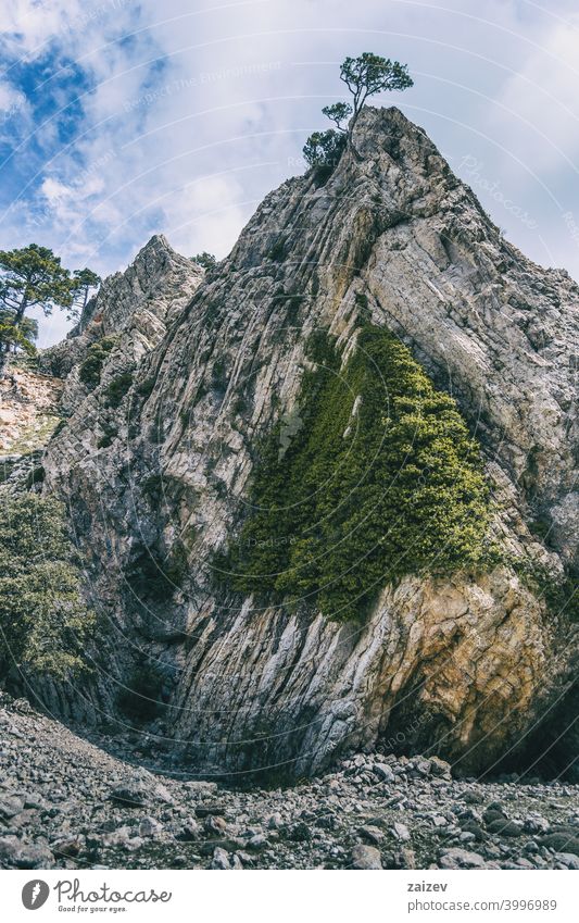 cloudy day in the mountains of the natural park of the ports, in tarragona (spain). eroded layered photography canyon nature outdoors travel destinations