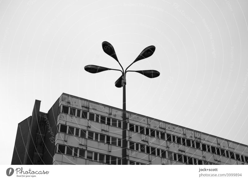 Lantern at grey abandoned house Facade Downtown Berlin Post-war modernism GDR Nostalgia for former East Germany Retro Office building Style dreariness